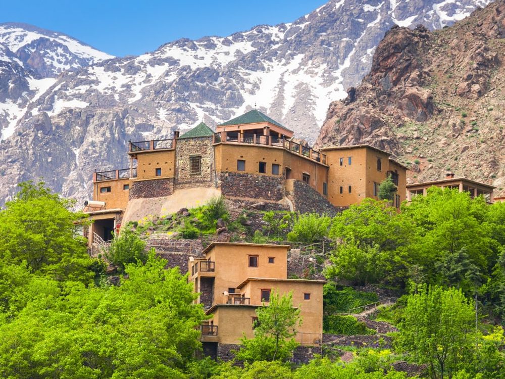 A stone village below the snow-capped peaks of Toubkal, at Imlil