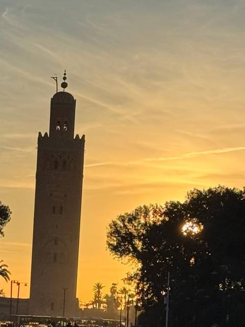 The Koutoubia minaret against a golden sunset