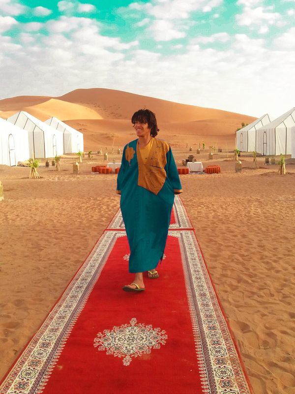 The desert camp, white tents and carpets