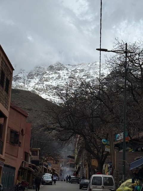 An Atlas village beneath the snow-covered peaks